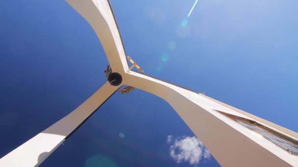 Bottom view of high white bell tower. Bell on top of tower — Stock Video