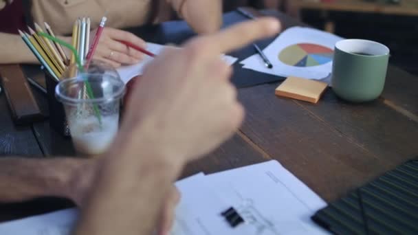 Business people teaming together putting their hands on each other on table — Stock Video