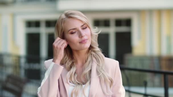 Portrait woman talking by wireless headset. Girl having talk by earphones — Stock Video