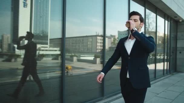 Closeup businessman using smartphone at street. Businessman walking at street — Stok video