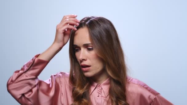 Stressed businesswoman having problem at work. Woman touching head with hand — Stock Video