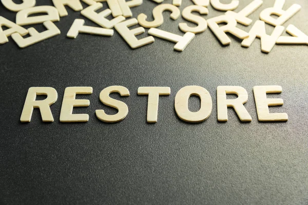 Restore Word Made Wooden Letter — Stock Photo, Image