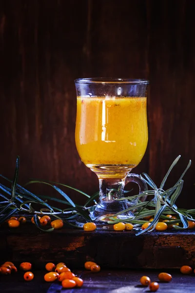 Sea buckthorn hot drink in a glass