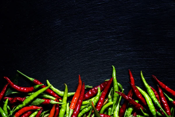 Red and green small hot peppers — Stock Photo, Image