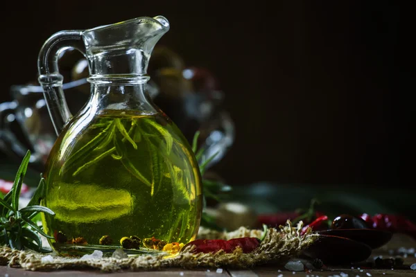 Olive oil with spices — Stock Photo, Image