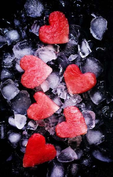 Sweet hearts of watermelon on crushed ice
