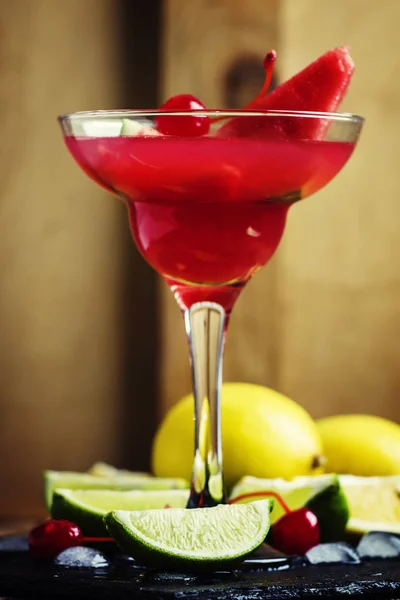 Alcoholic cocktail with watermelon, lemon, lime, tequila and ice — Stock Photo, Image