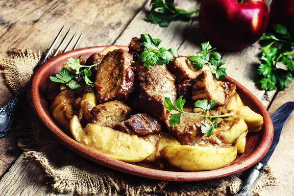 Pork baked with quince — Stock Image Pork baked with quince Royalty Free Stock Images