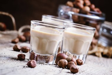 Creamy liqueur with hazelnuts clipart