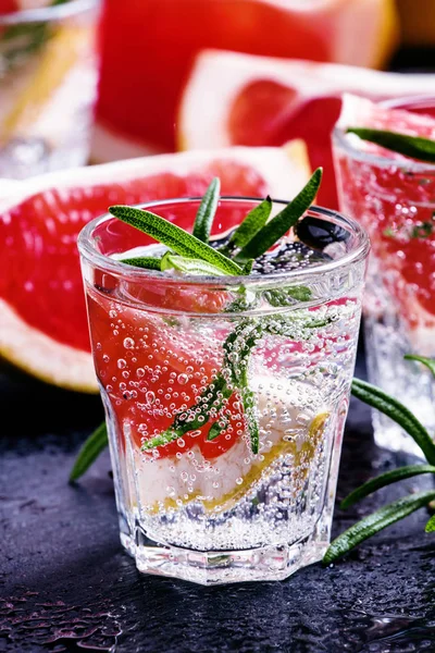 Citrus refreshing lemonade with rosemary and grapefruit