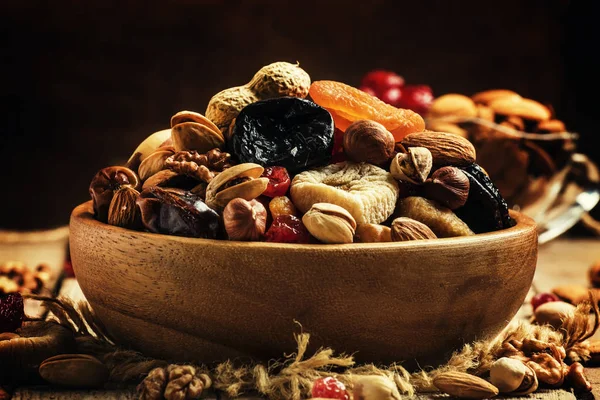 Healthy food: nuts and dried fruits — Stock Photo, Image