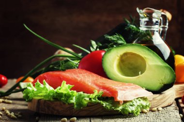 Ingredients for salad with smoked salmon and avocado clipart