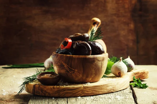 Marinated mushrooms with pepper and garlic — Stock Image Marinated mushrooms with pepper and garlic Royalty Free Stock Photos