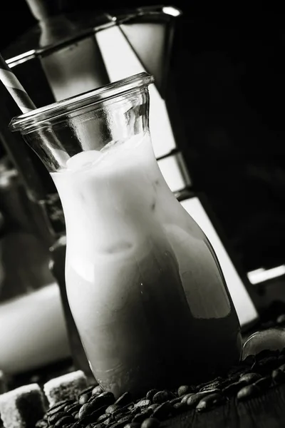 Black coffee with ice and milk — Stock Photo, Image