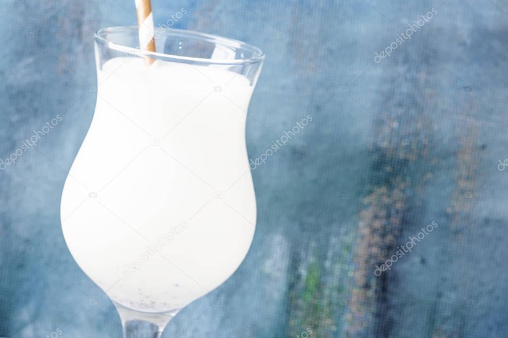 Vanilla milkshake in a large glass