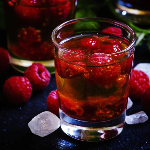 Cocktail with whiskey and raspberries — Stock Photo, Image