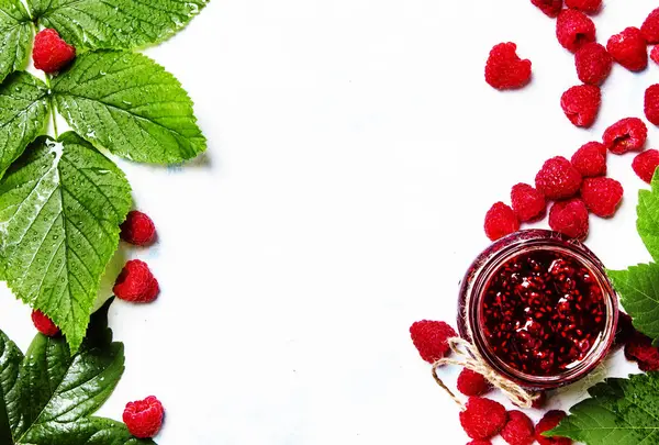 Raspberry jam in glass jar — Stock Photo, Image