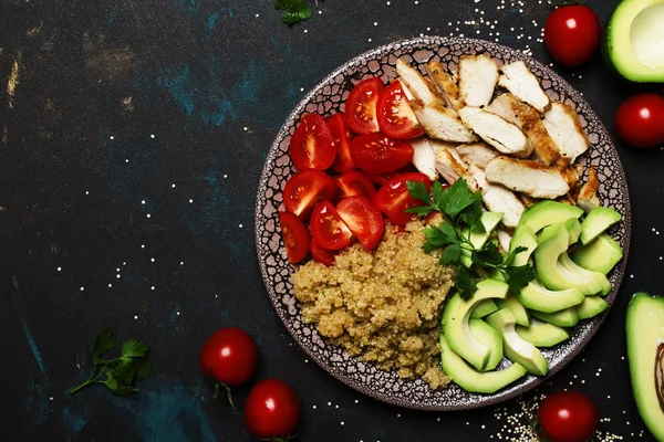 Healthy food, avocado, quinoa, chicken and tomatoes