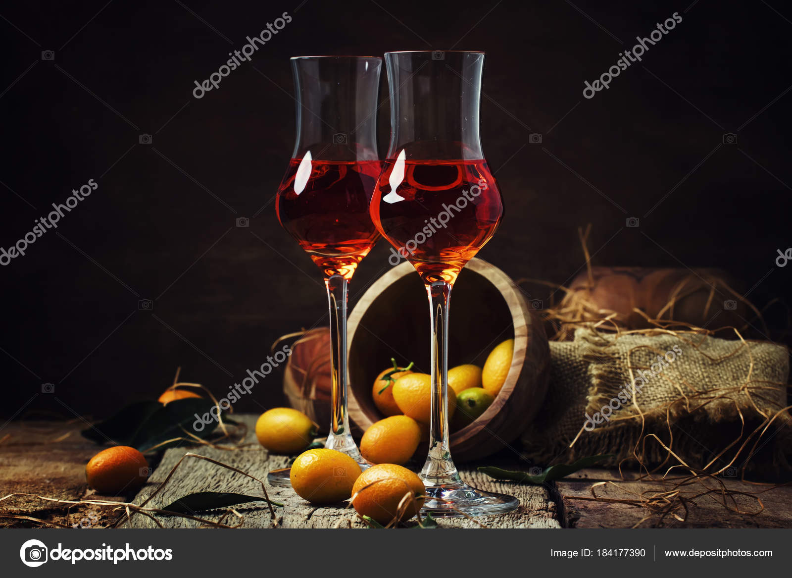 Traditional Greek Kumquat Liqueur Shot Glasses Vintage Background Rustic Style Stock Photo Traditional Greek Kumquat Liqueur Shot Glasses Vintage Background Rustic Style Stock Photo