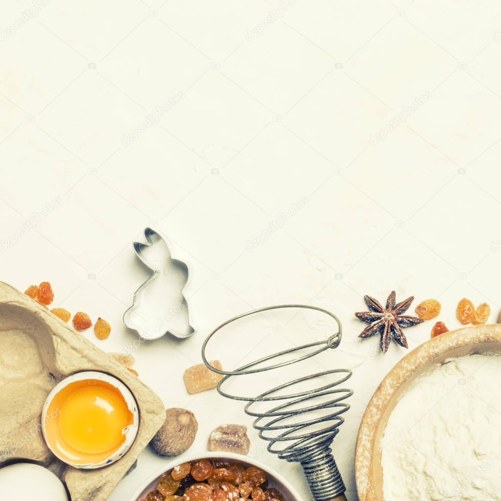 Easter baking ingredients, white food background, top view