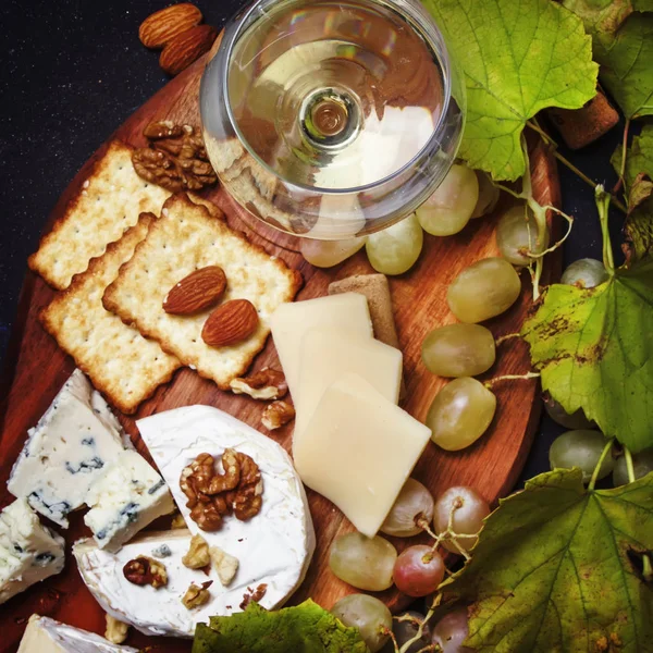 White Dry Wine Cheese Mold Nuts Grape Cracker Dark Background — Stock Photo, Image