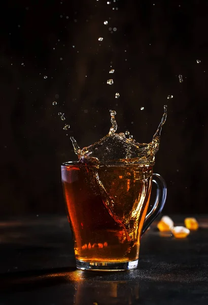 Splash Glass Cup Black Tea Natural Steam Brown Background — 스톡 사진