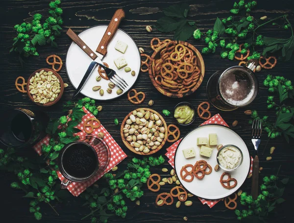 Light Dark Beer Mugs Salty Snacks Nuts Dark Wooden Table — Stock Photo, Image