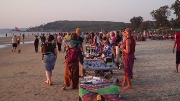 Arambol, India - February 2020. Flea tourist market on the beach in Arambol in Goa. — Stock Video