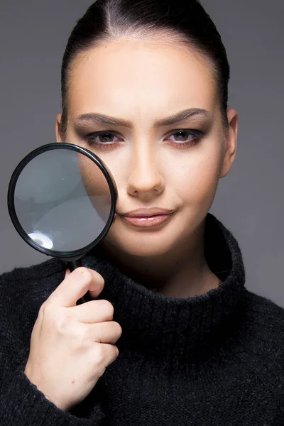 Girl with magnifier beauty skin concept — Stock Photo, Image