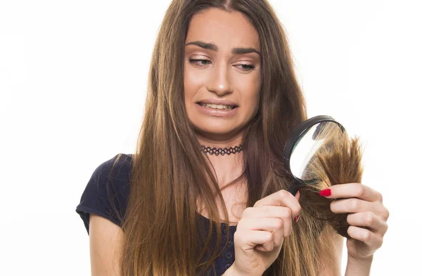 Girl with dry and damaged hair — Stock Photo, Image