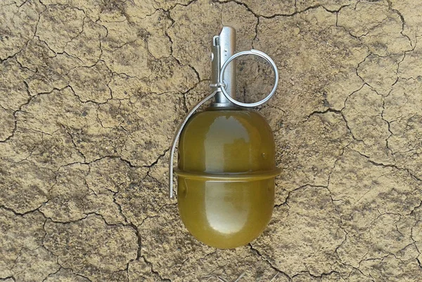 Combat Hand Grenade Dry Cracked Earth — Stock Photo, Image