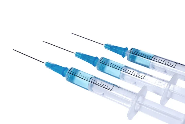 Trois Seringues Avec Vaccin Bleu Isolées Sur Fond Blanc — Photo
