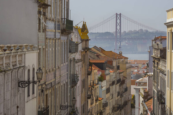 Lisbon, view of the famous bridge XXV April