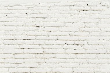 Beyaz boya arka plan dokusu ile eski tuğla duvar