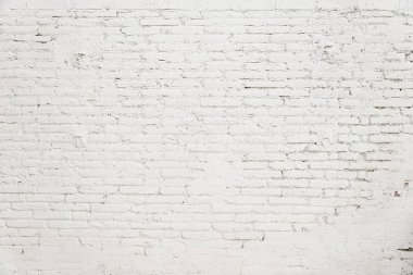 Beyaz boya arka plan dokusu ile eski tuğla duvar
