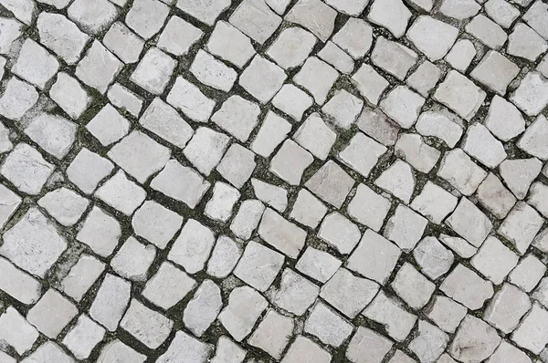 Gammal grå sten trottoaren bakgrund — Stockfoto