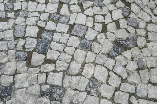 Old grey stone pavement background — Stock Photo, Image