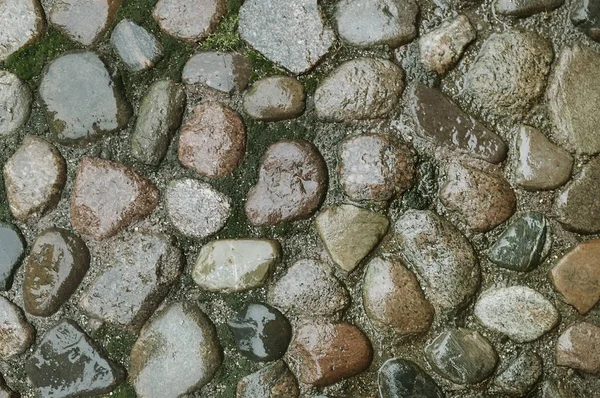 Idade marrom pedra pavimento fundo — Fotografia de Stock