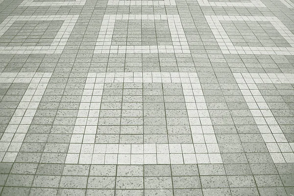 Estrada mosaico pavimento fundo — Fotografia de Stock