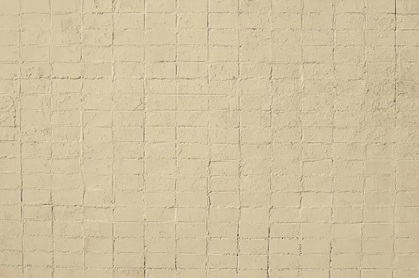 Gamla beige tegel vägg bakgrund — Stockfoto