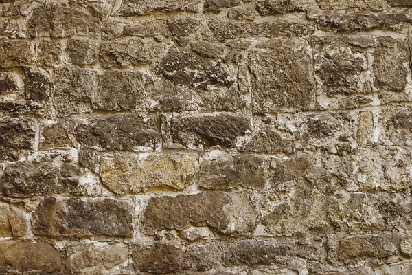 Fondo de pared de mosaico de piedra marrón — Foto de Stock