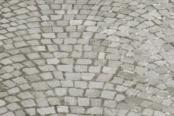 Gamla gre sten trottoar bakgrund — Stockfoto