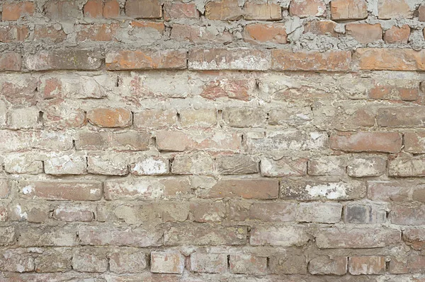 Brick wall with white paint — Stock Photo, Image