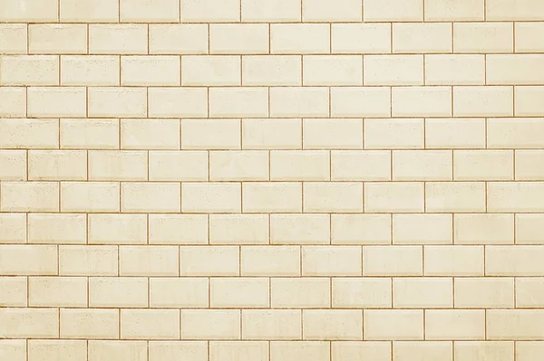 Old beige tile brick wall background texture — Stock Photo, Image