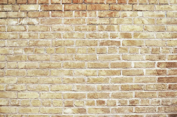 Old beige brick wall background texture — Stock Photo, Image