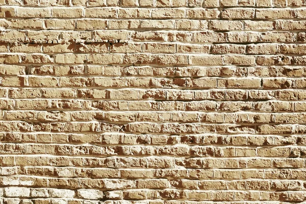 Gamla beige brick wall bakgrundsstruktur — Stockfoto