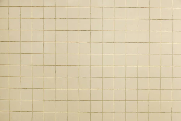 ベージュのモダンなタイルの壁の背景テクスチャ — ストック写真