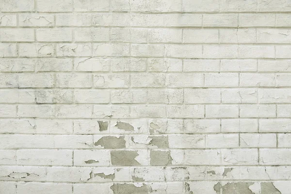 Oude bakstenen muur met witte verf achtergrond — Stockfoto