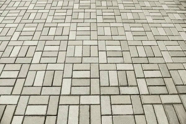 Mosaik granit trottoar bakgrund Royaltyfria Stockfoton