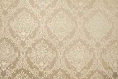 Bej çiçekli duvar kağıdı arkaplan dokusu